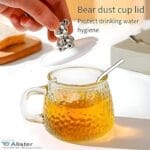 كوب زجاجي لطيف على شكل دب مع غطاء وملعقة (سعة 300 مل) - مثالي للاستمتاع بالحليب والعصائر والشوكولاتة والقهوة المثلجة؛ مقدم من "Elegant Home" المتميز في توريد المنتجات. - الصورة 2